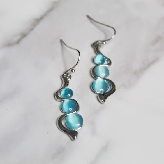 Silver tone and blue stone earrings