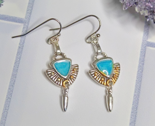 Silver earrings with turquoise stones and gold accents